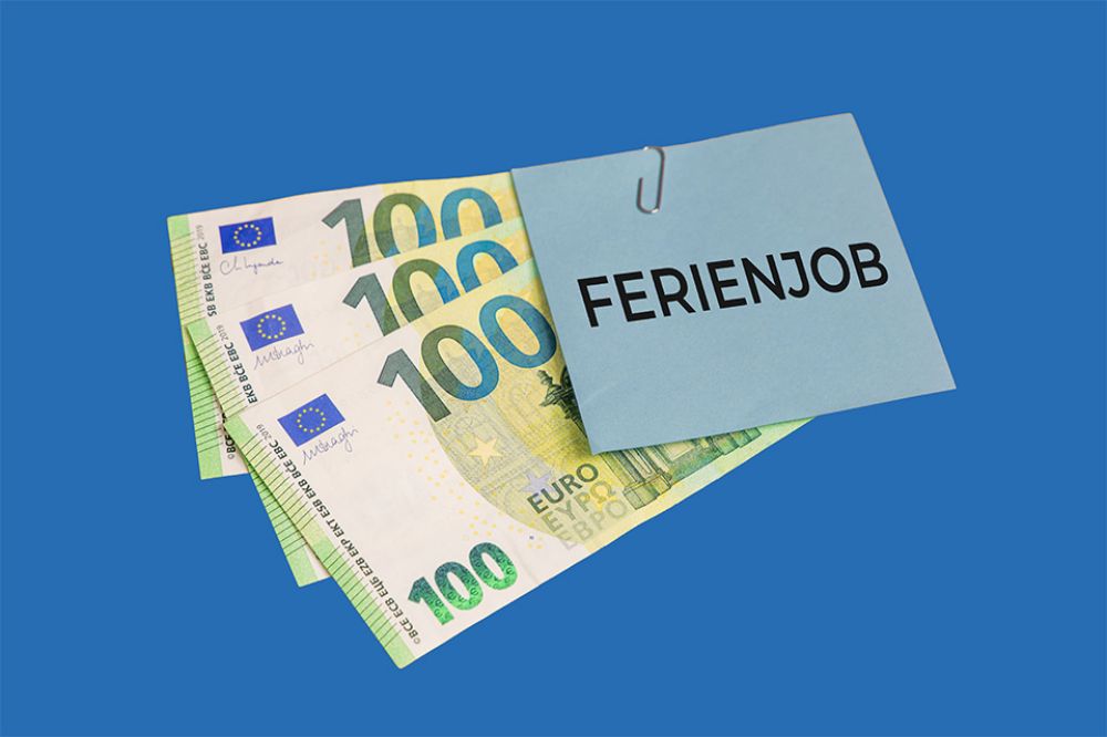 Foto: 100-Euro-Banknote und Ferienjob